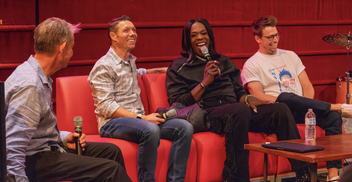 (Left to right) Jonathan McHugh, event organizer and music professor, Tim Kappel, Big Freedia's lawyer and professor, Big Freedia, and Reid Martin, Big Freedia's manager, talk at the event on Sept. 9.